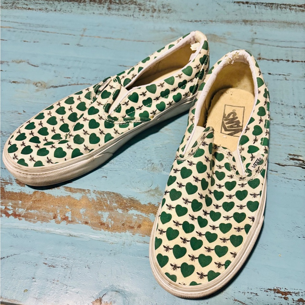Vans Cream Slip-On Sneakers with Green Heart Motif
